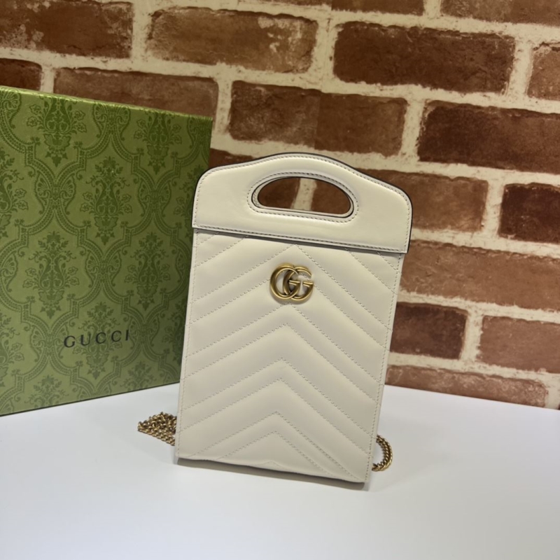 G*u*i top handle bags